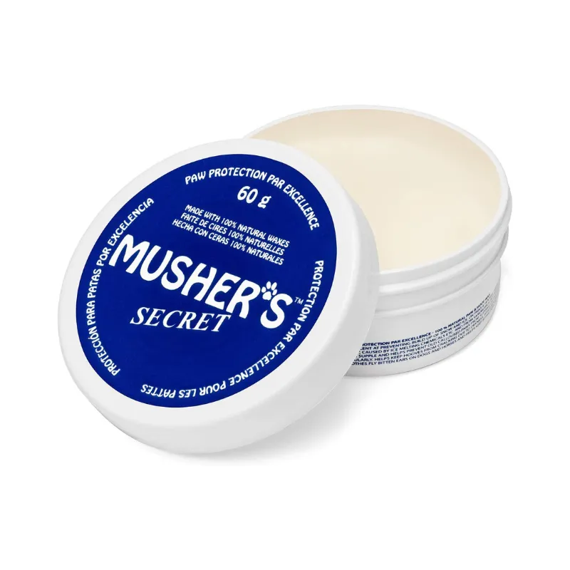 Musher's Secret paw protection balm in a white container, designed for moisturizing and protecting Maltese dog paw pads.