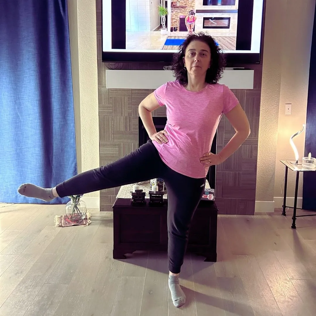 Ivana exercising at home, featured in a client testimonial for Galina Penev
