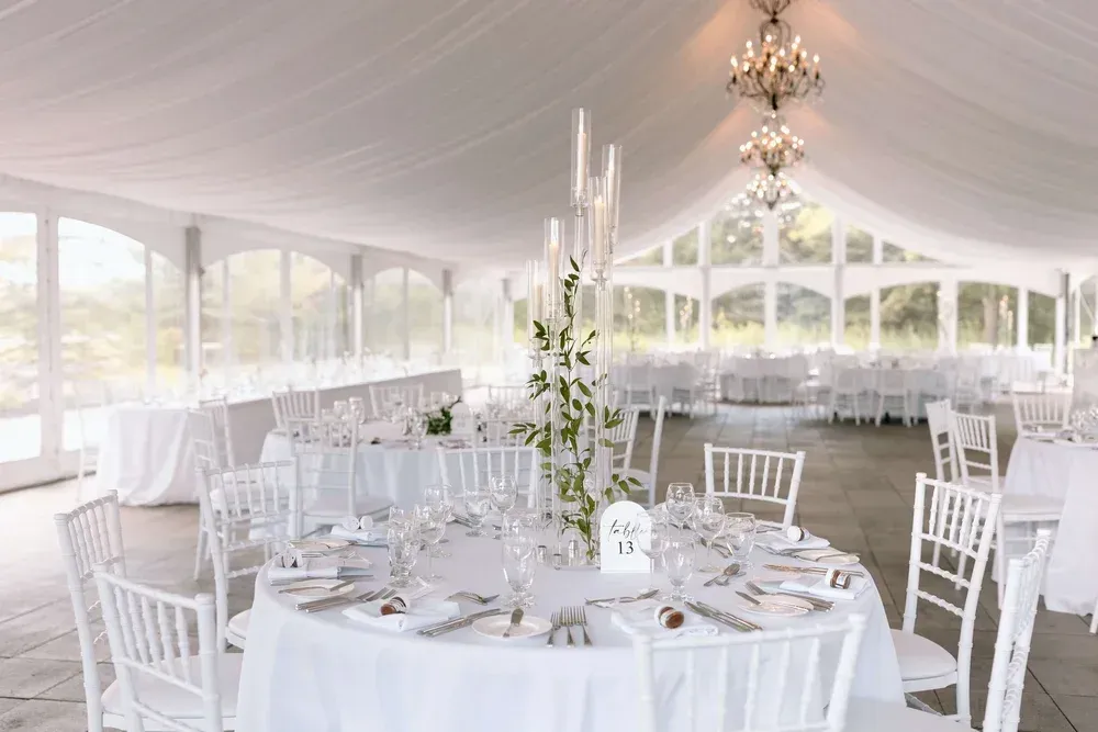 Elegant table setting with white floral arrangements