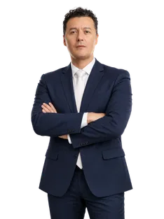 Retrato profesional de Raúl Tributario