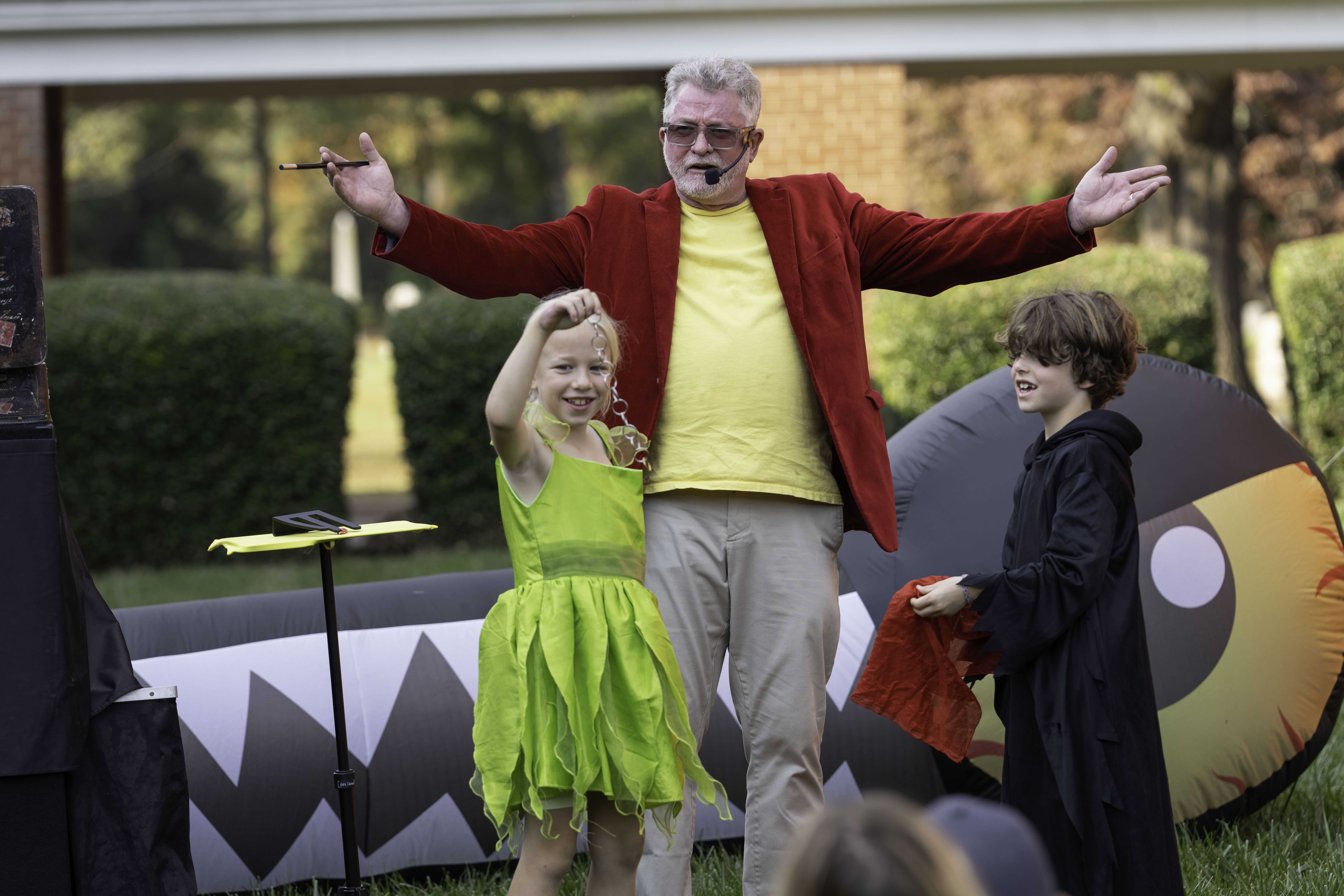 Uncle Bucks Magic Show performing at a festival in Charlotte NC