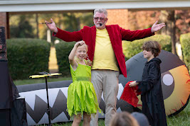 Uncle Bucks Magic Show performing at a festival in Charlotte NC
