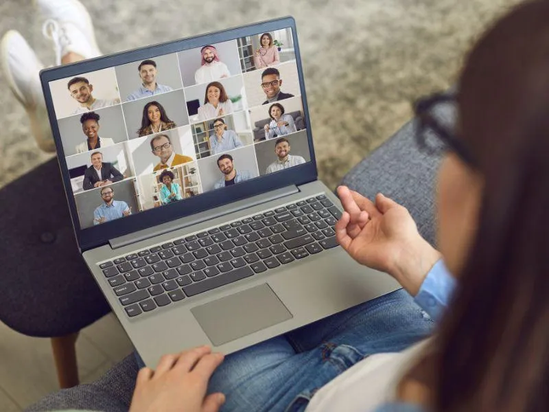 lady with a laptop on a group online call