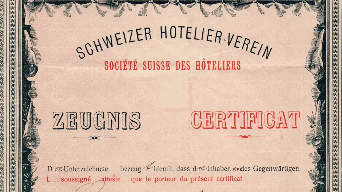 En-tête d'un certificat de travail de la Société suisse des hôteliers, en allemand et en français