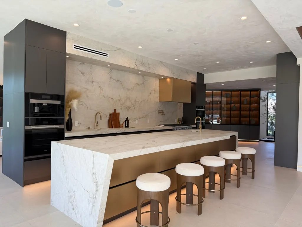 Private on-site design consultation in a sunlit coastal living room
