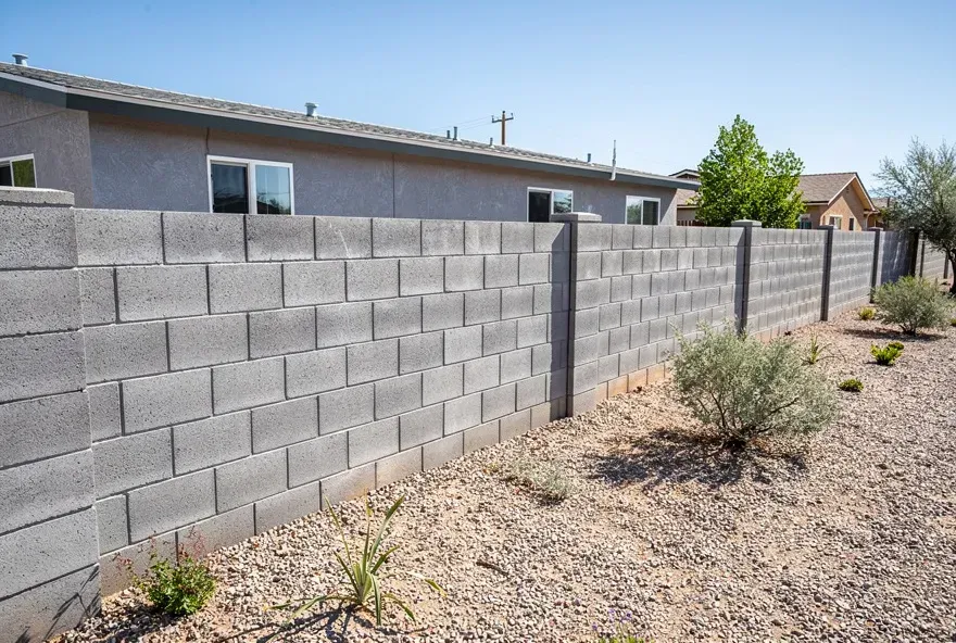 Newly constructed concrete block wall in a Lancaster, California backyard