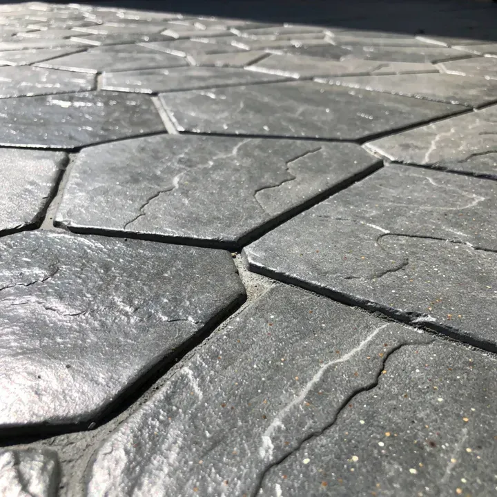 Close-up of slate gray stamped concrete texture and pattern in Lancaster, CA