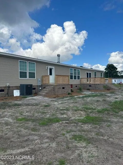 Back Side of Home and Back Yard at Clariday Estates