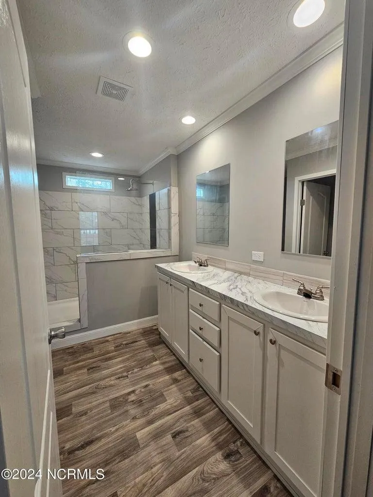 Beautiful Bathroom with two mirrors and walk in shower