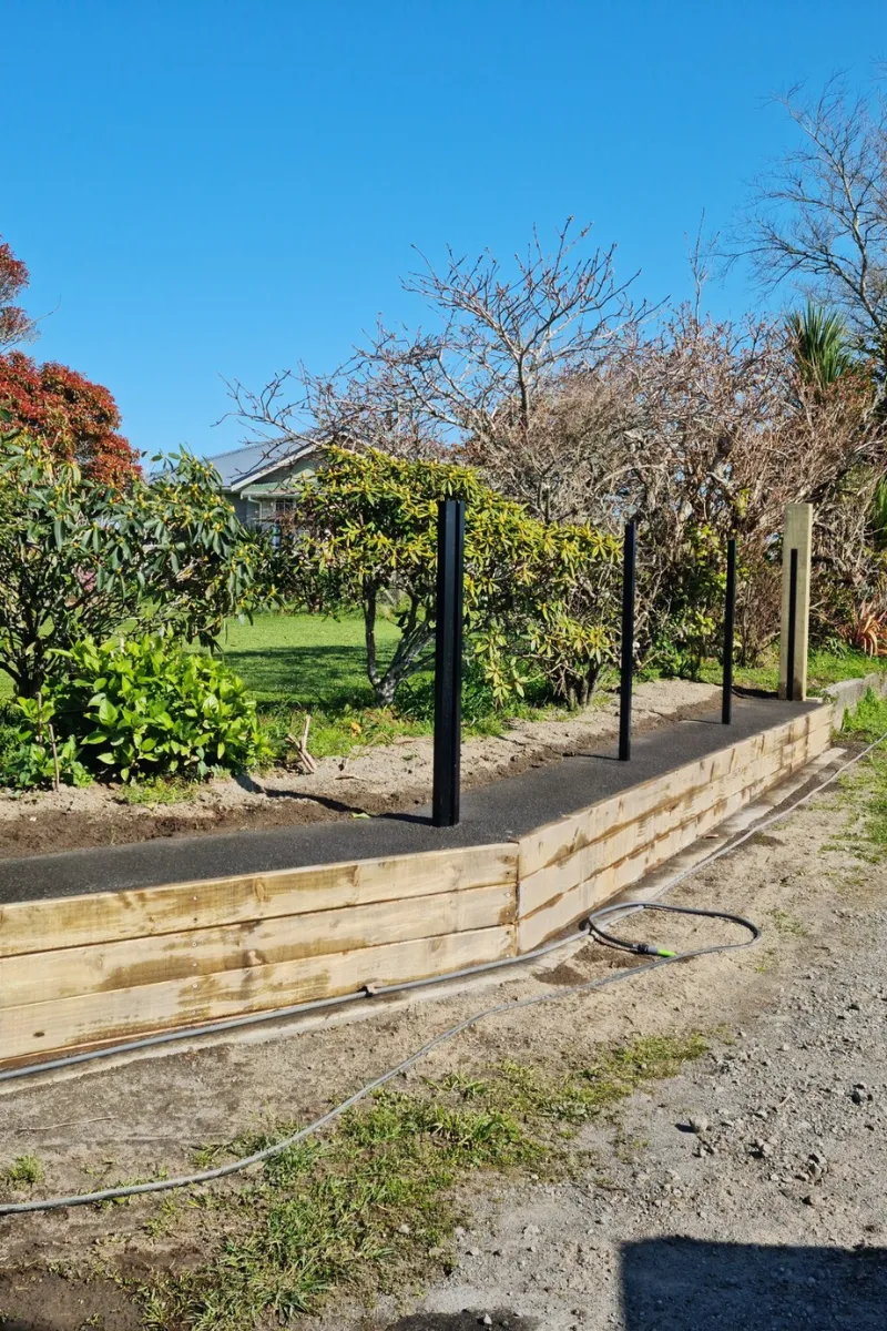 Excavator performing earthworks in New Zealand