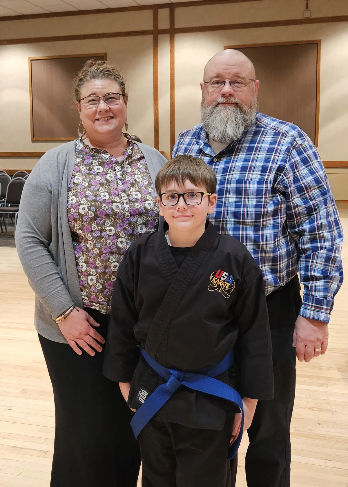 Amy Cummings with her husband, Brett, and her son, Eddie