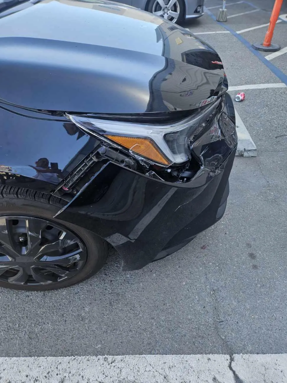 Toyota Camry front end impact damage after a slow speed car crash