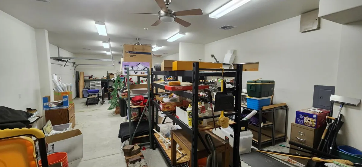 A person riding a bike with a large bag on the back of it