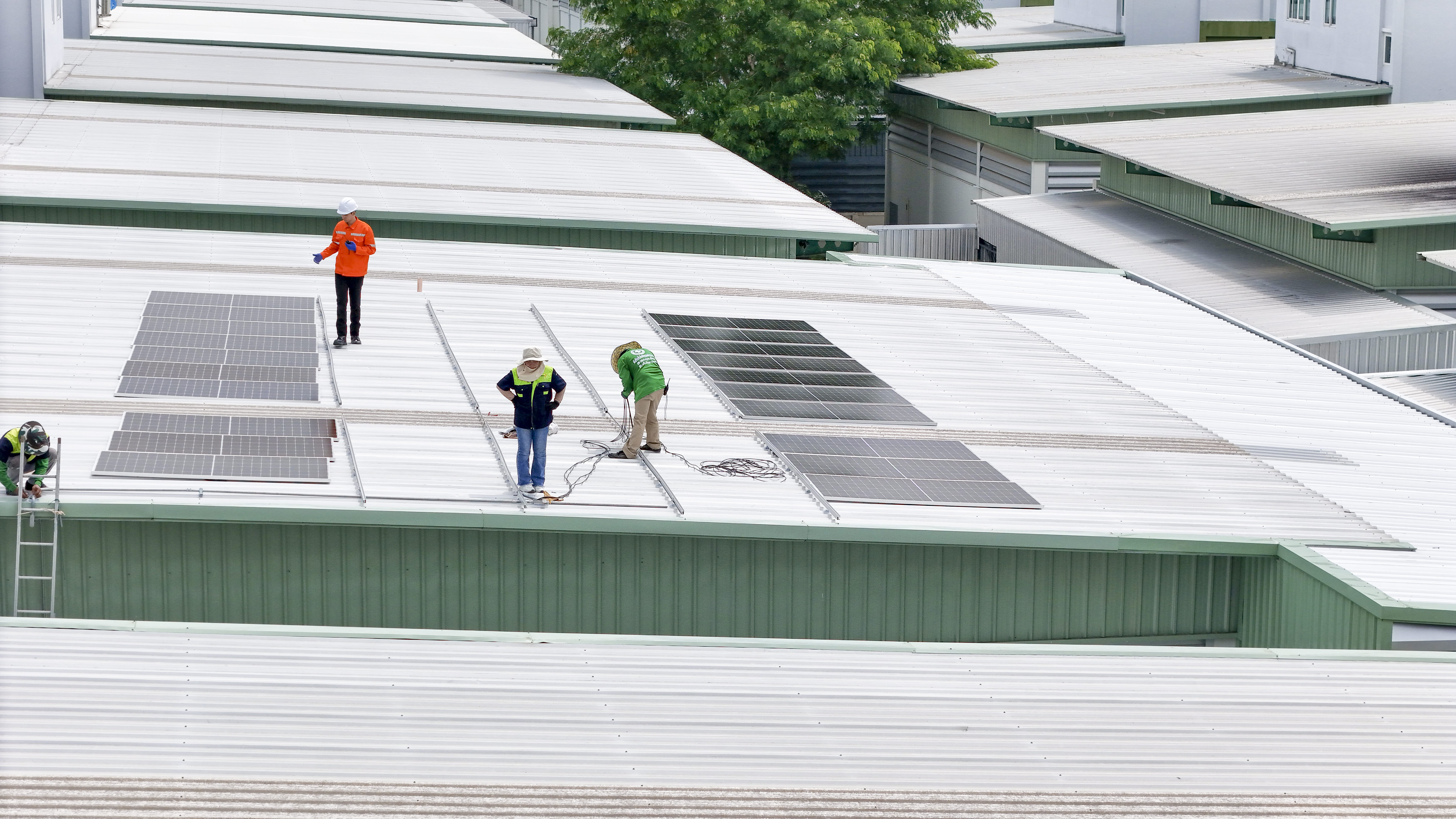 Red tiled roof against a bright blue sky