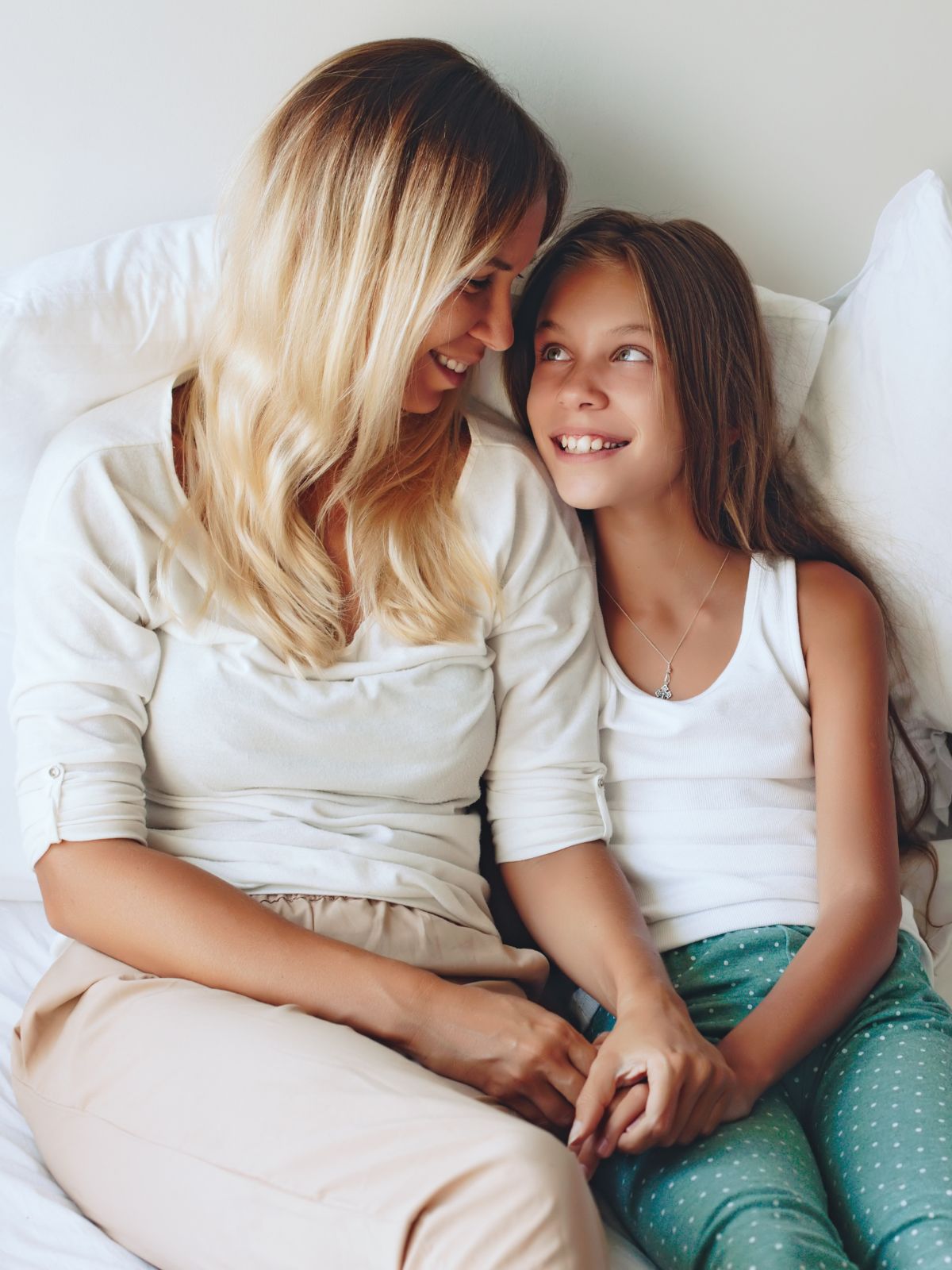 Parent and child sharing a calm, connected moment together - representing the peaceful family dynamic possible with the right ADHD parenting strategies