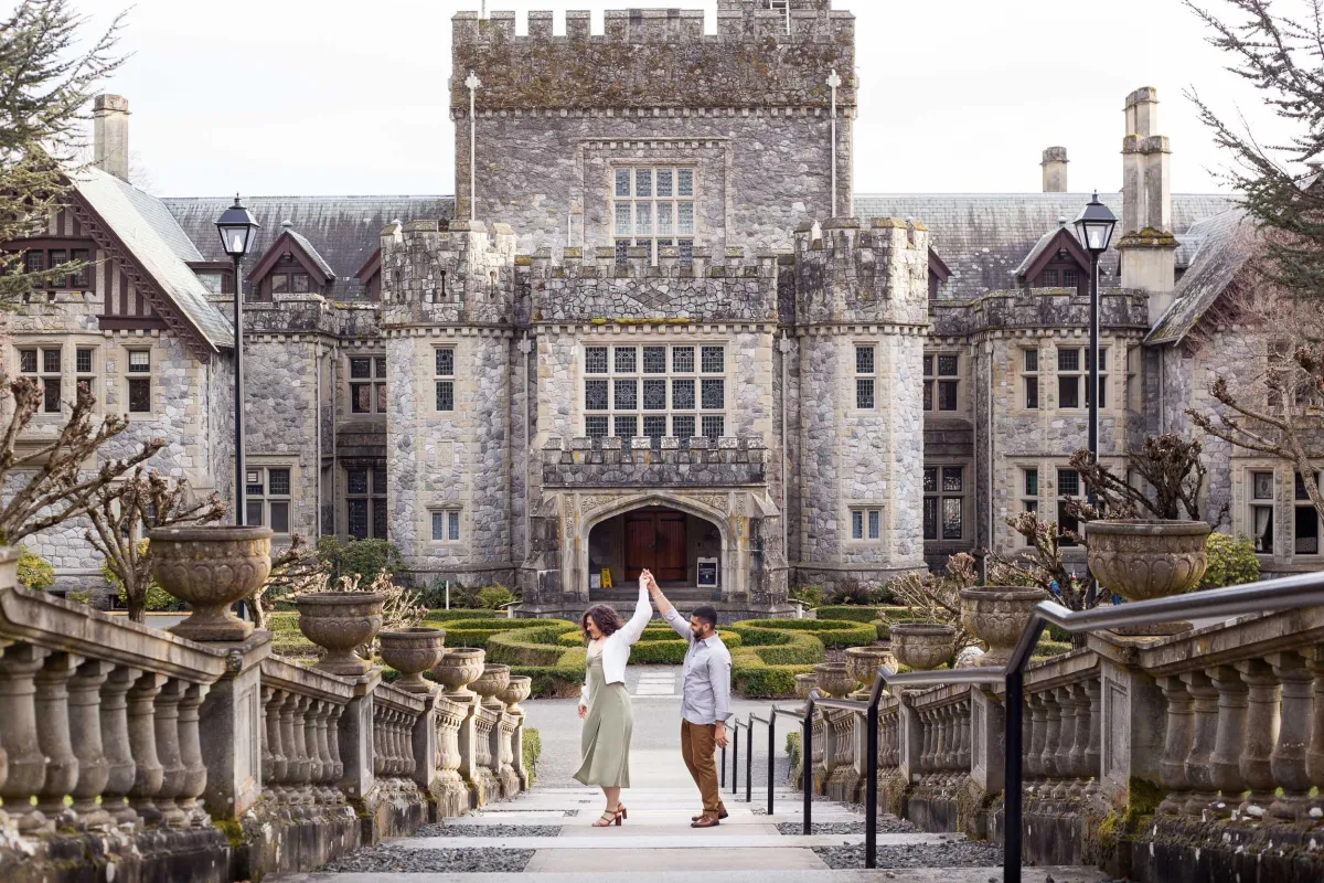 Couple dancing outside of Hatley Castle at Royal Roads University in Colwood BC