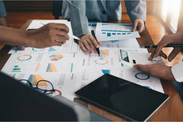 SME founder reviewing marketing gaps with a consultant — Growth Genies Marketing and Brand Audit