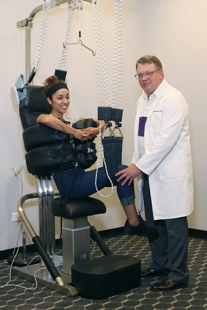 Dr. Murphy performing PROTEC floating manipulative therapy spinal decompression Kenosha WI