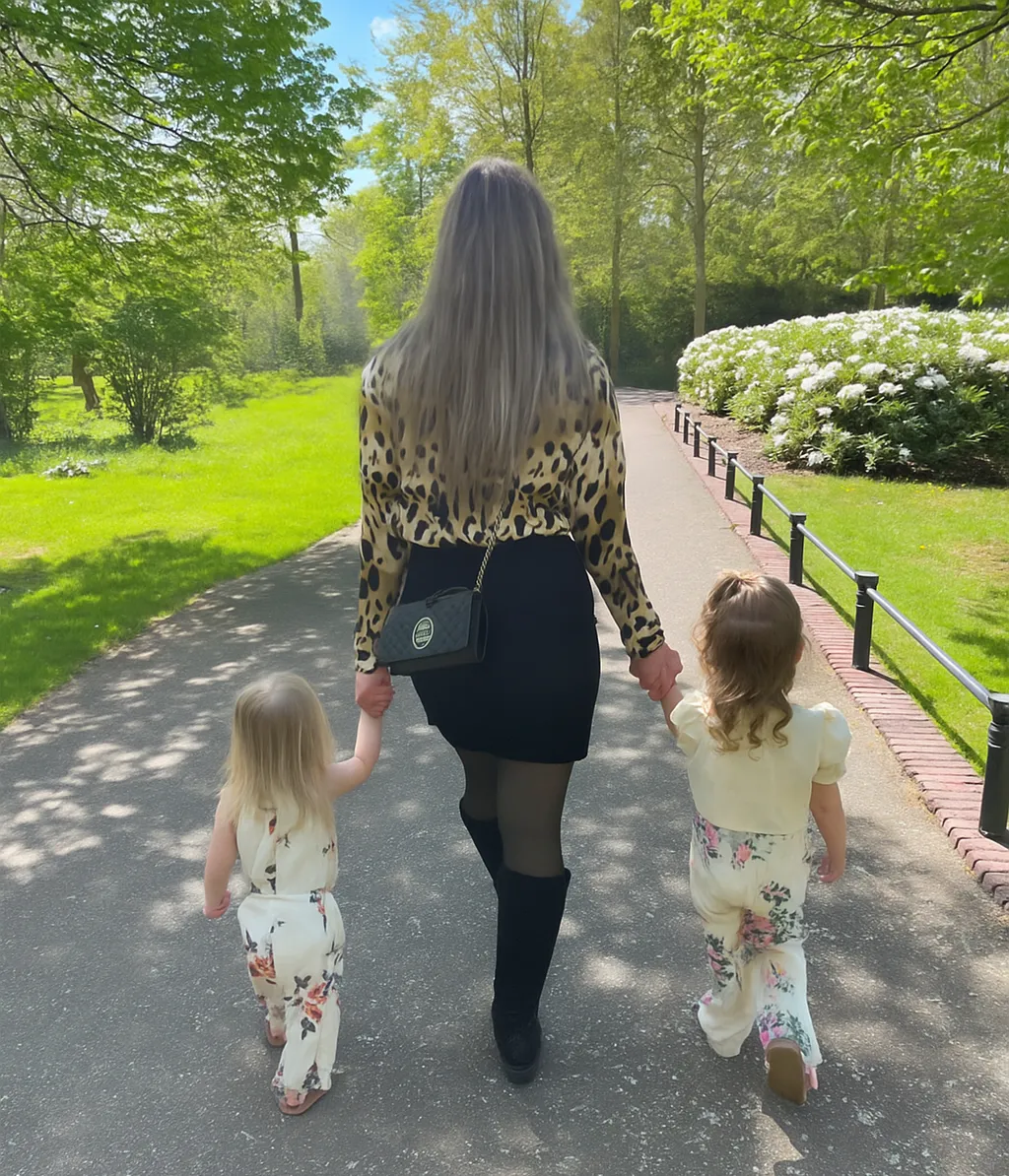 a row of bottles of perfume sitting on a table
