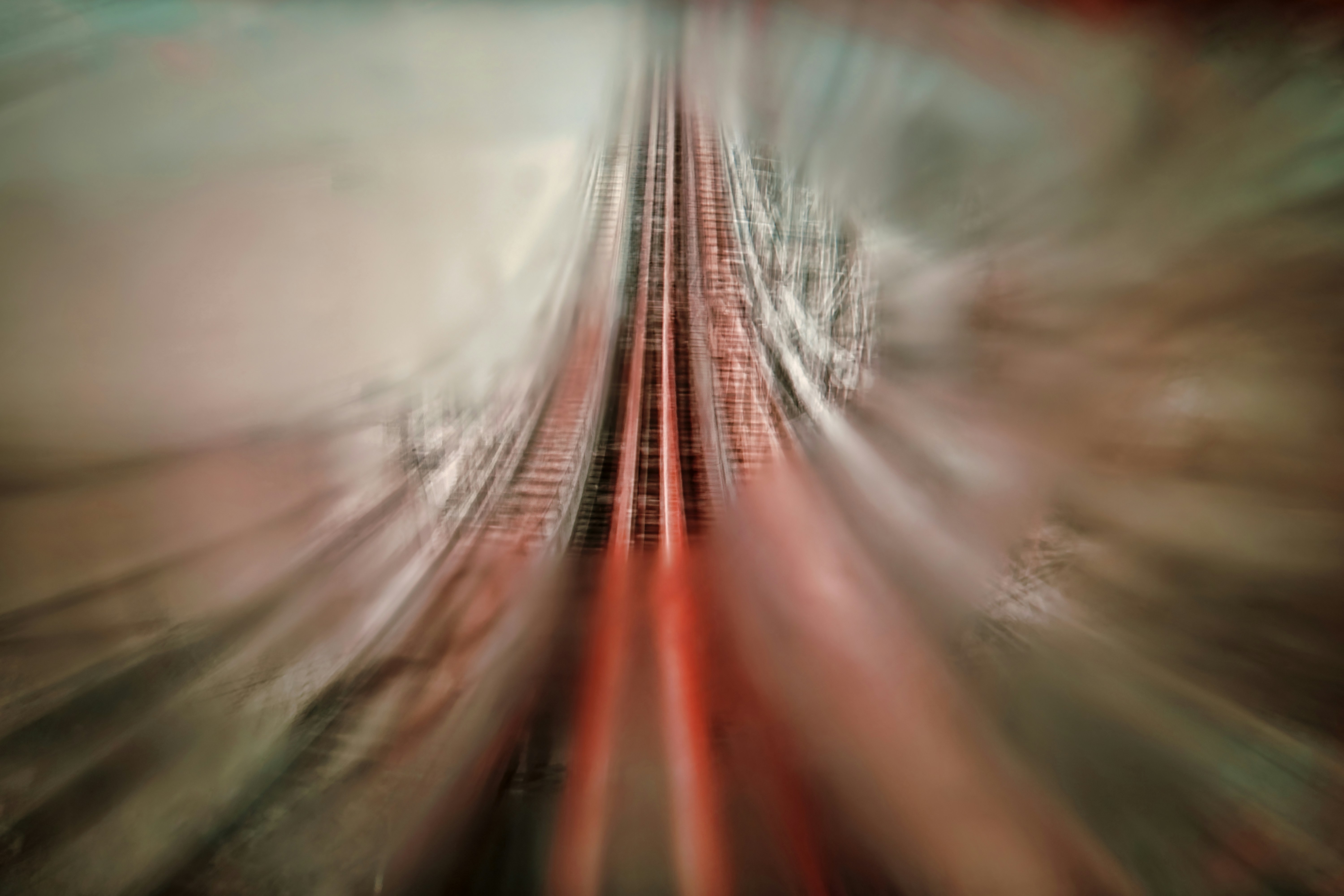 Motion-blurred railway tracks symbolizing urgency, reactive decision-making, and the challenge of reclaiming strategic time.