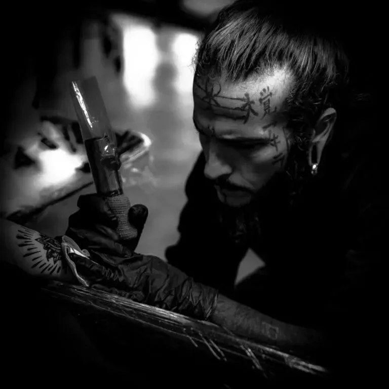 cory claussen owner and best artist at red arbor tattoo shop