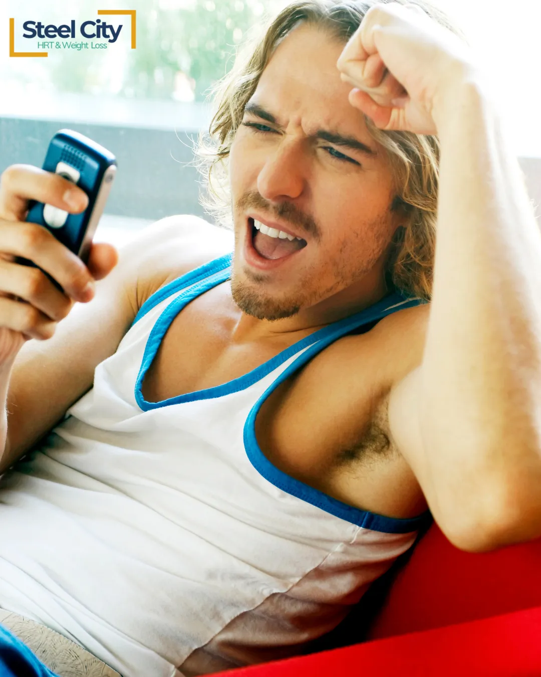 A man on his phone reading our blog