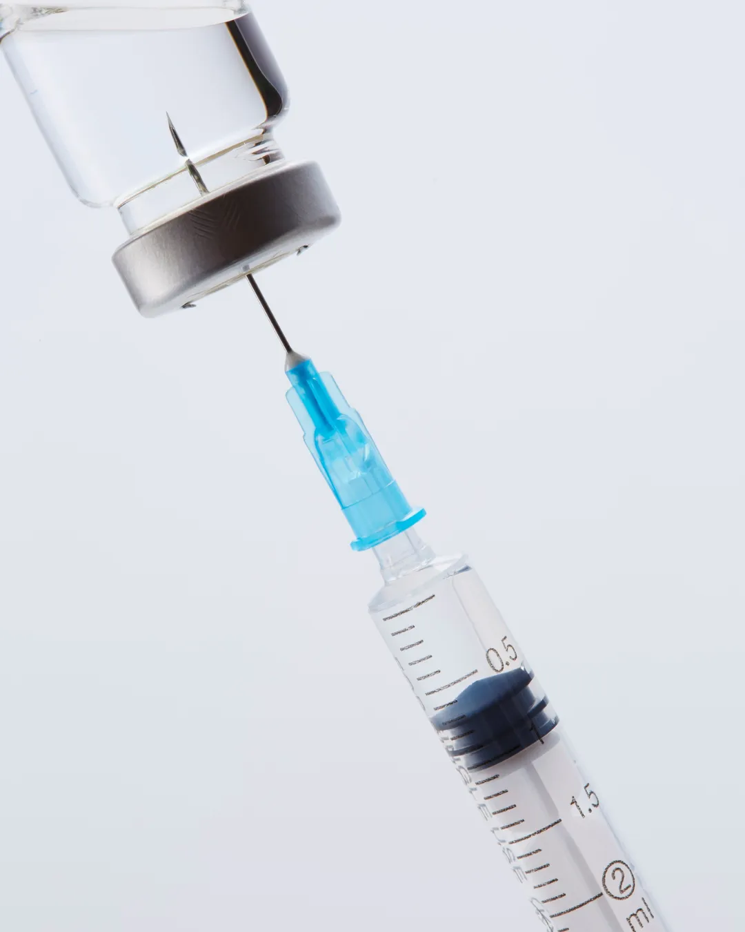 needle drawing up medication