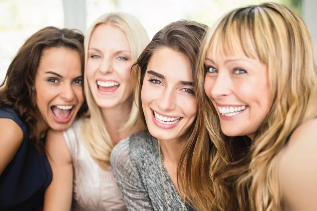 Four friends, whom are women, that are excited about their Botox party. 