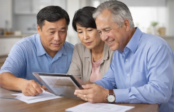 black iphone 5 beside brown framed eyeglasses and black iphone 5 c