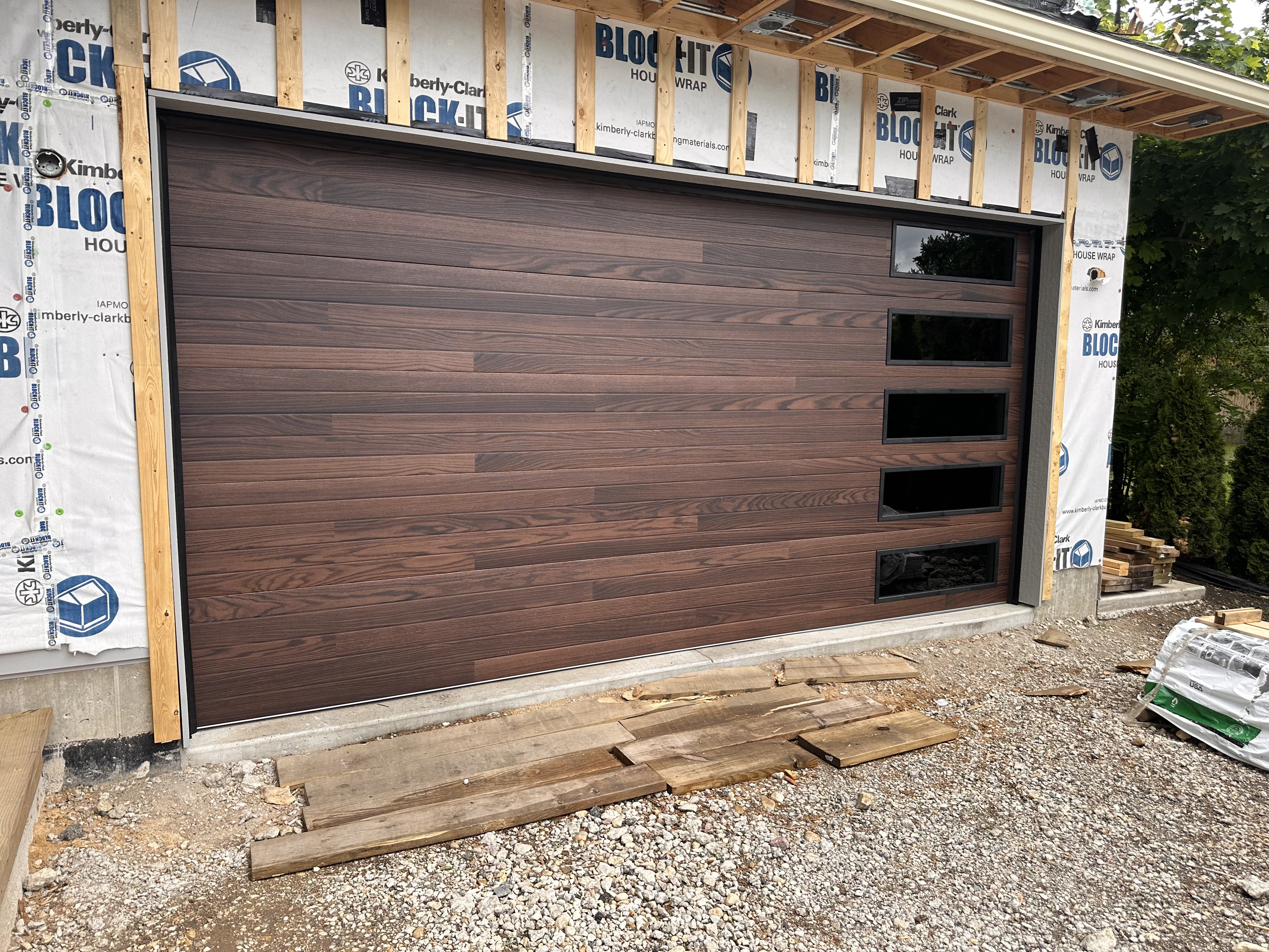 Garage door installed on a renovating house