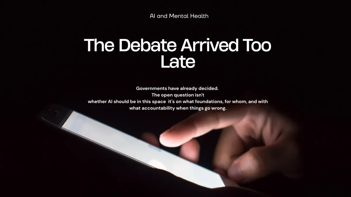 A hand illuminated by the glow of a smartphone screen against a dark background. Text overlay reads: "The Debate Arrived Too Late -- Governments have already decided. The open question isn't whether AI should be in this space -- it's on what foundations, for whom, and with what accountability when things go wrong.