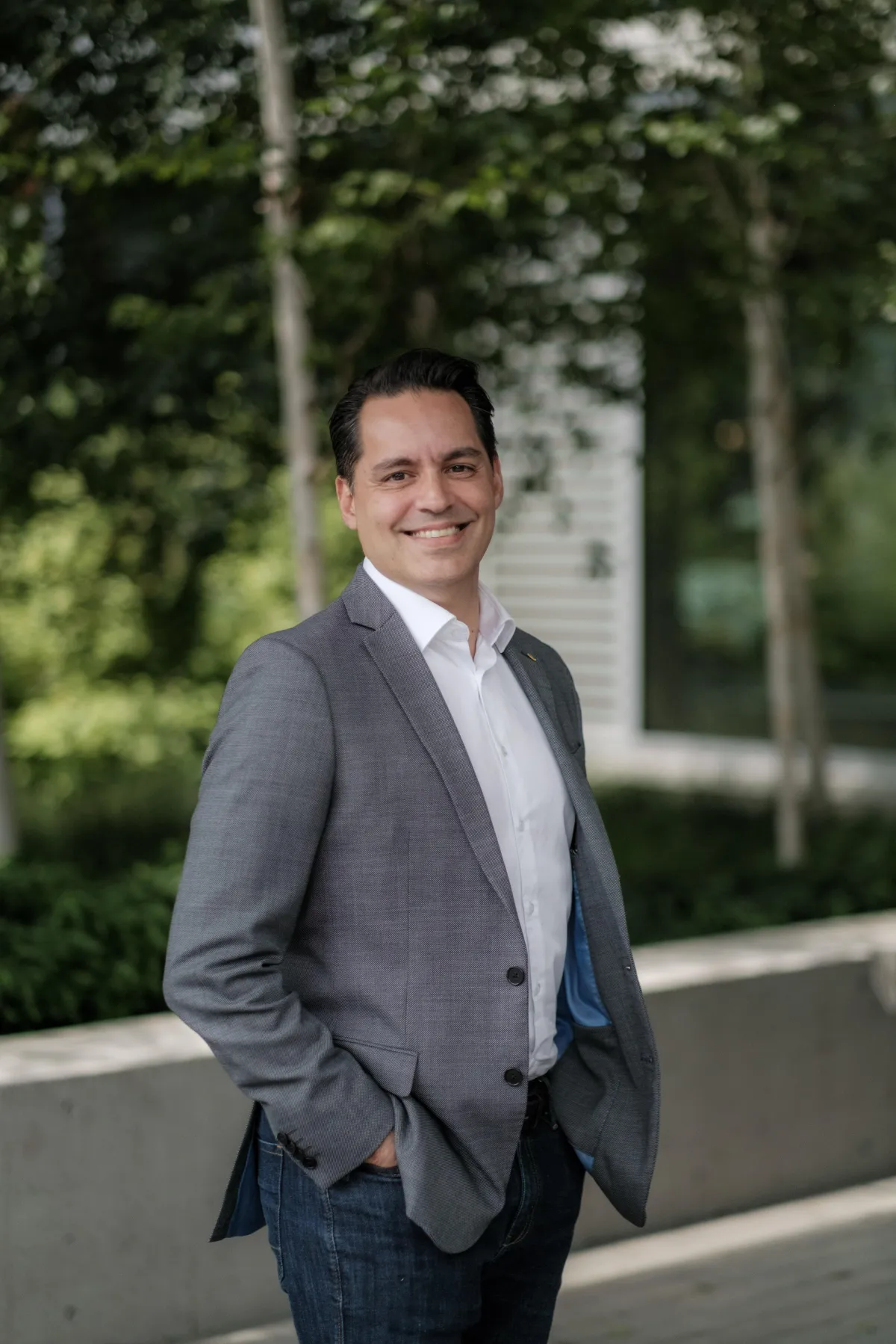 a living room with a lot of glass doors
