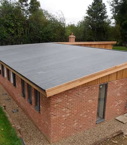 Completed flat roof on a brick extension with EPDM rubber membrane