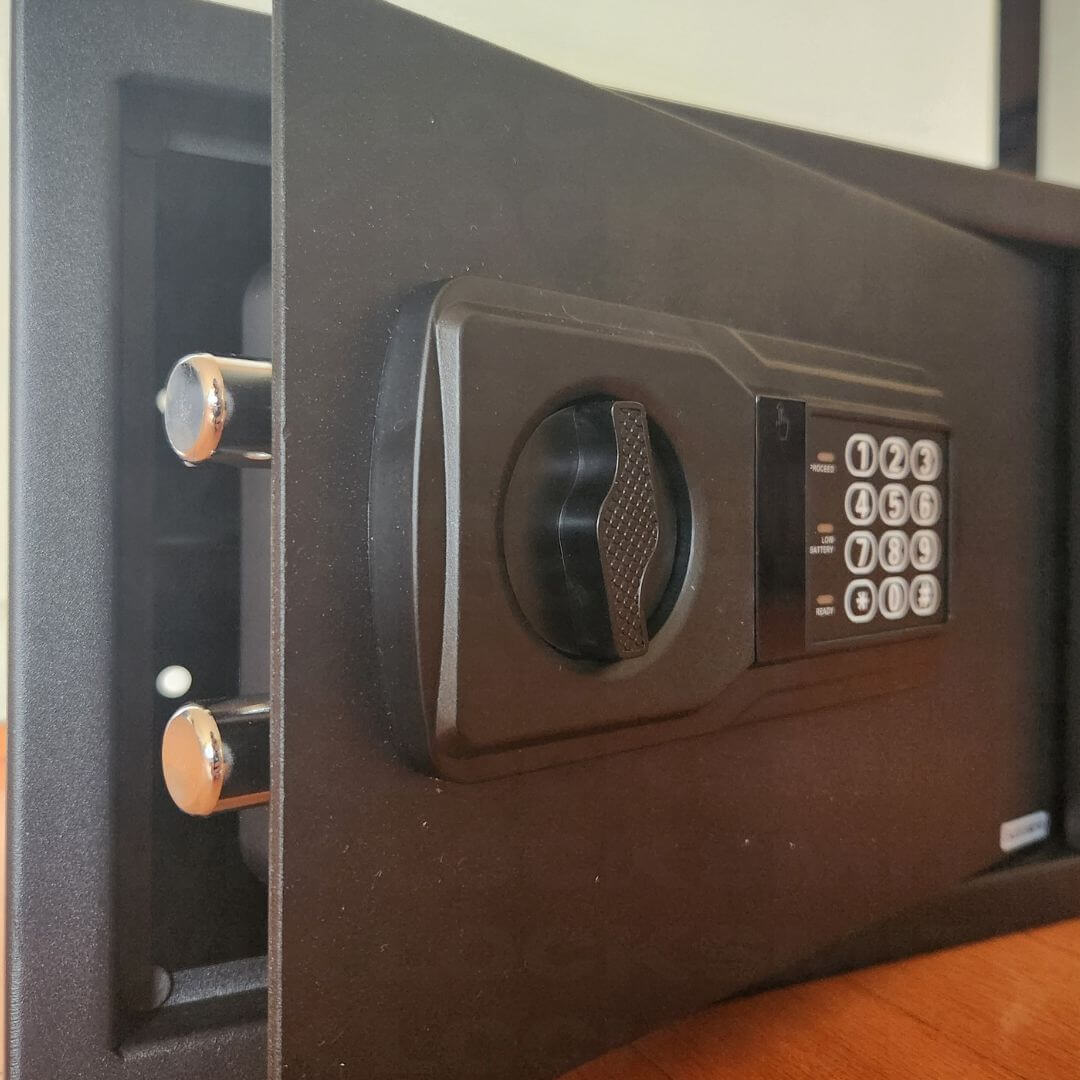 Safe opening service showing unlocked safe door and contents access