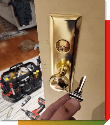 Residential locksmith rekeying a front door deadbolt for improved home security