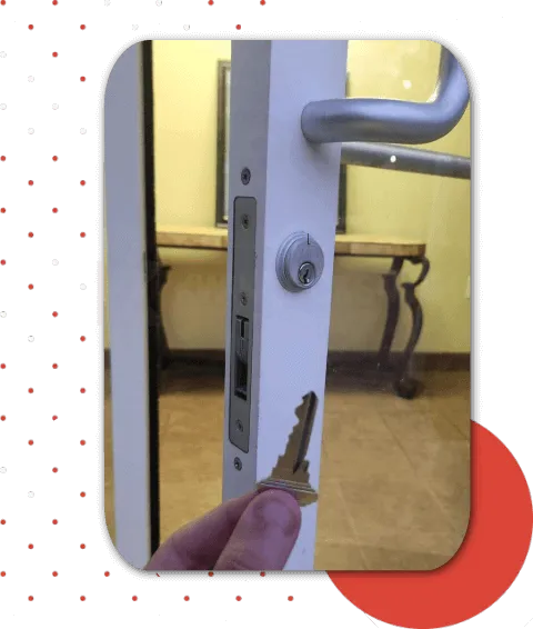 Business entry lock service showing key and commercial door hardware