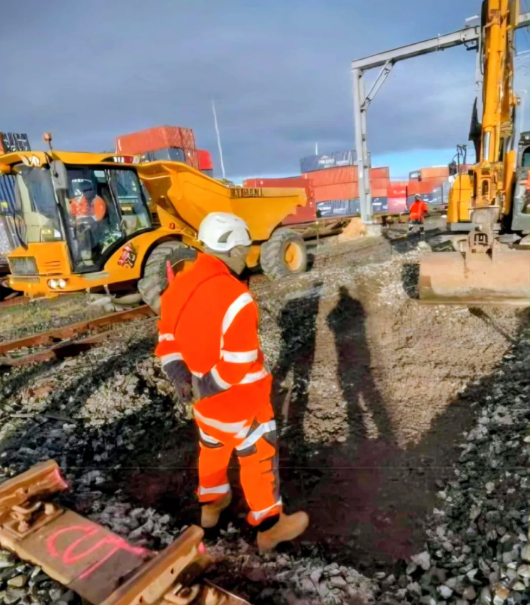 Machine operator using excavator on construction site in Auckland