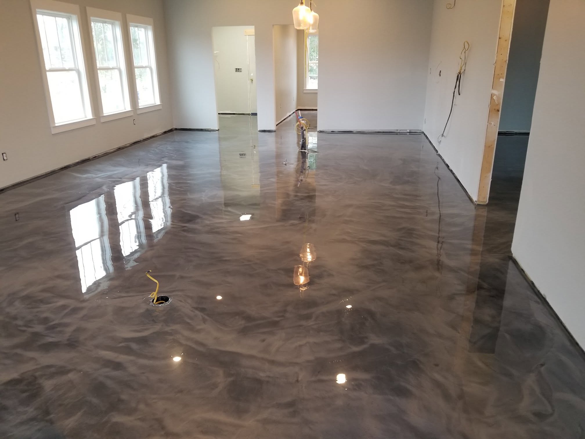 Commercial high-traffic polished concrete slab installation