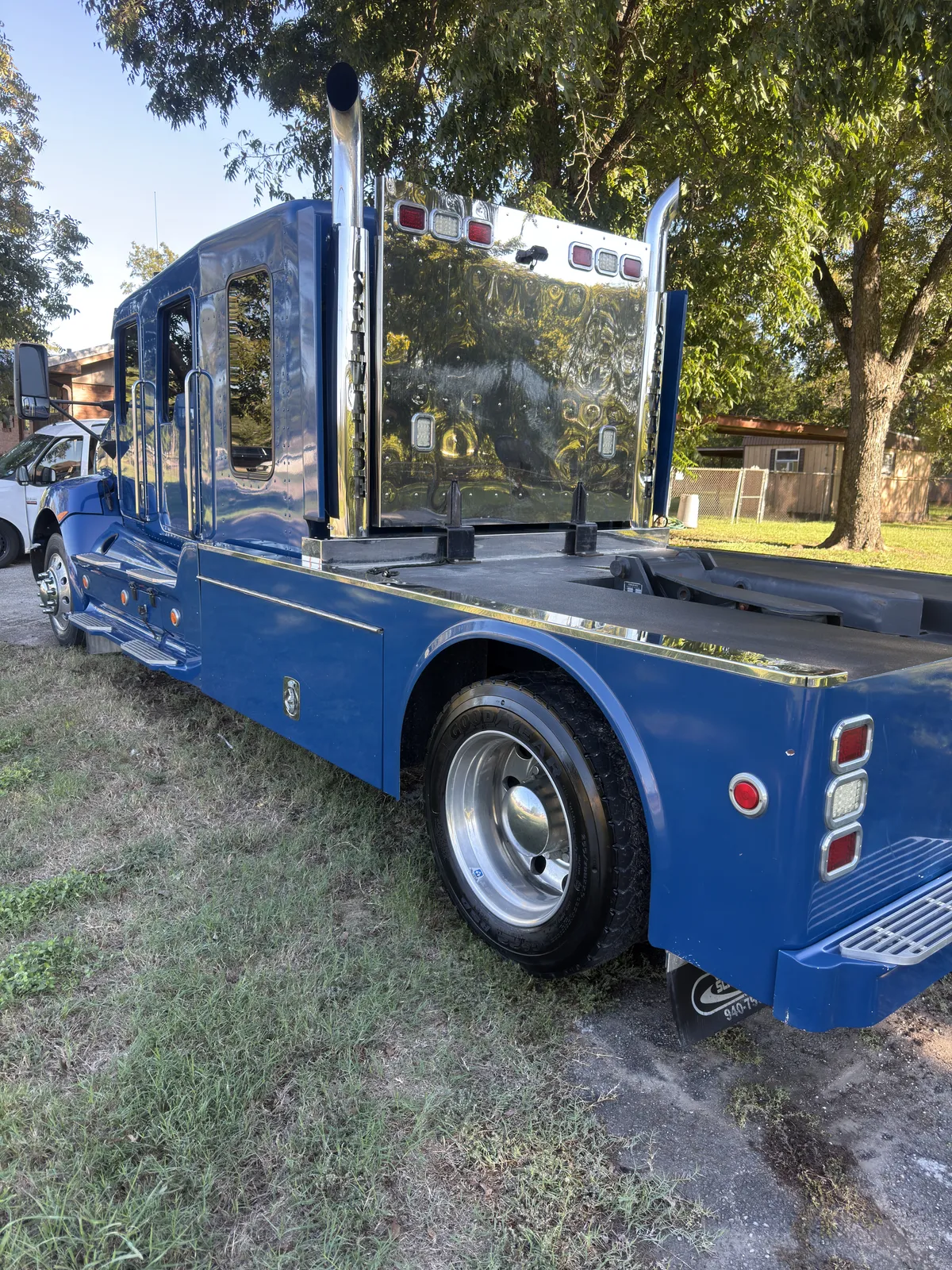Clean blue flatbed work truck