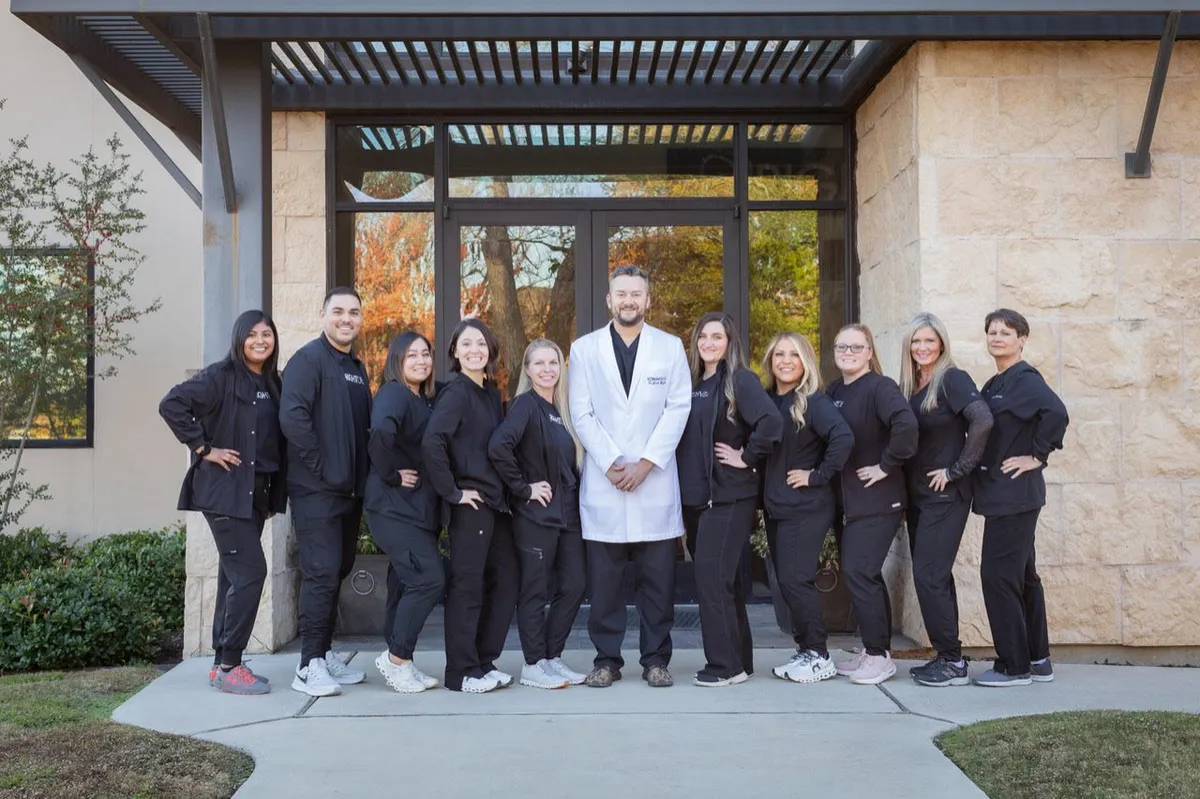 Dr. Justin Wright, DDS and the Just Wright Dental and Implant Center team outside their Corsicana, TX teeth whitening office