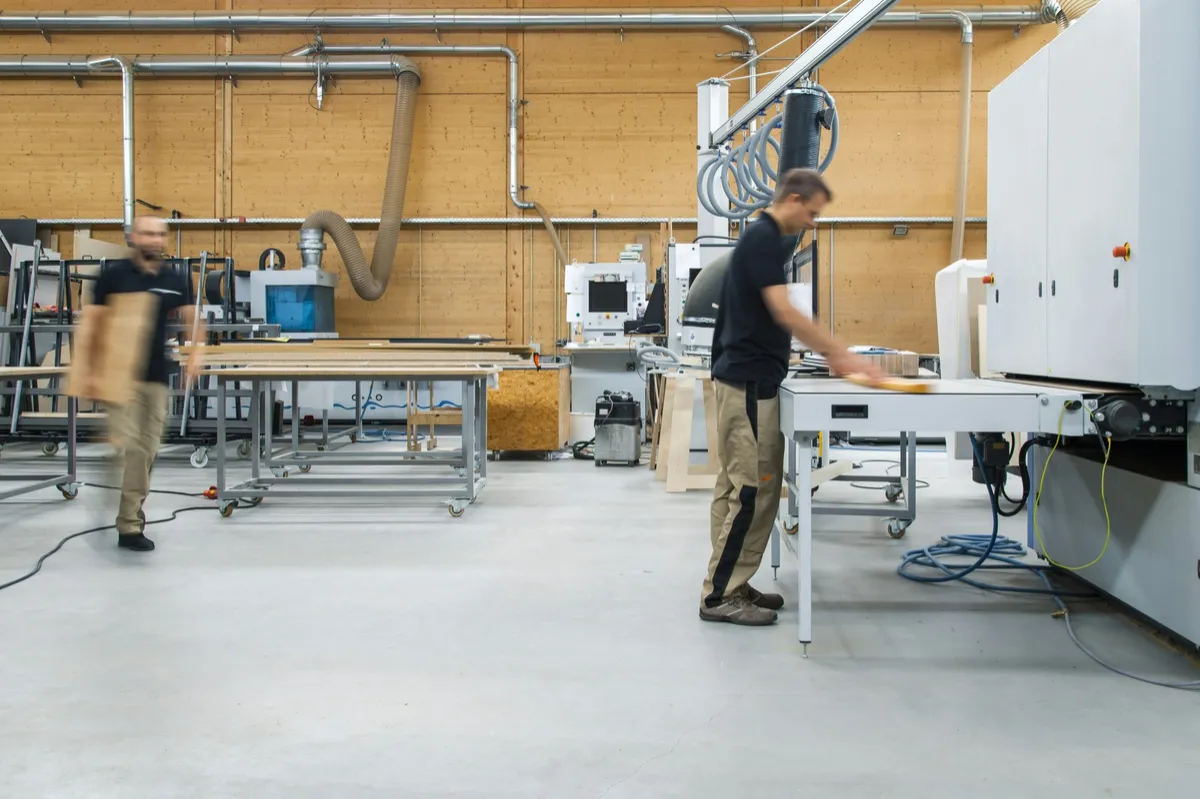 Employees at work in a modern workshop