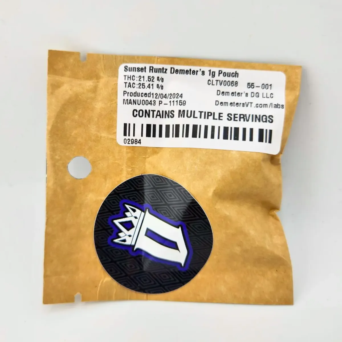 Brown pouch labeled “Sunset Runtz” Demeter’s 1g cannabis flower with product details, THC percentage, and more on the packaging