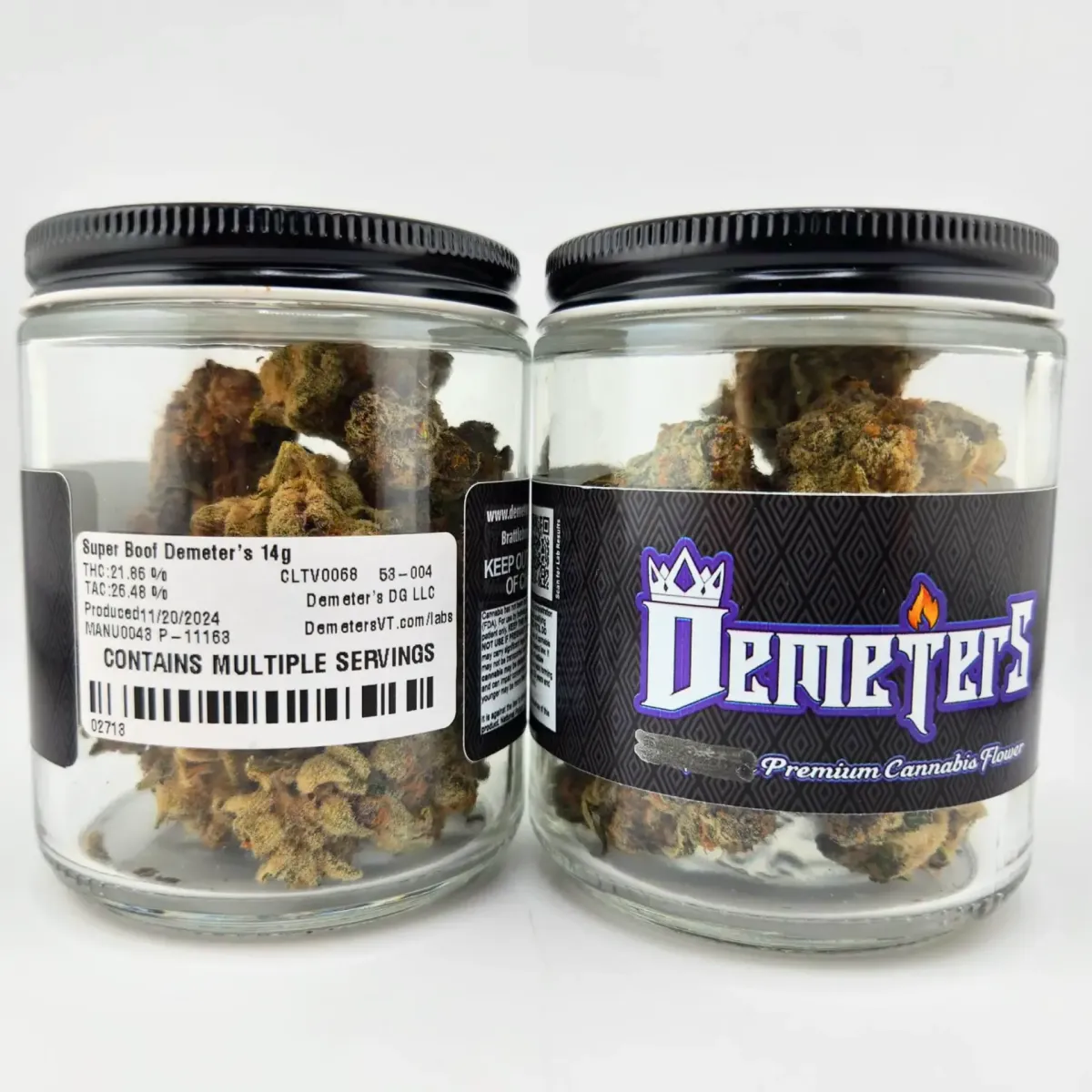 Two jars of Demeters cannabis flower labeled “Super Boof” strain, 14g, with branded black label and product details visible