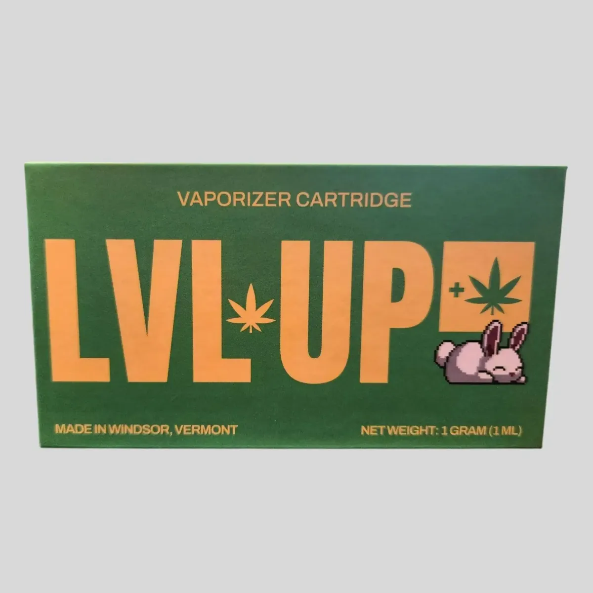 LVL UP cannabis vaporizer cartridge, 1 gram vape cart, made in Windsor, Vermont, featuring green packaging with pixel art bunny design.