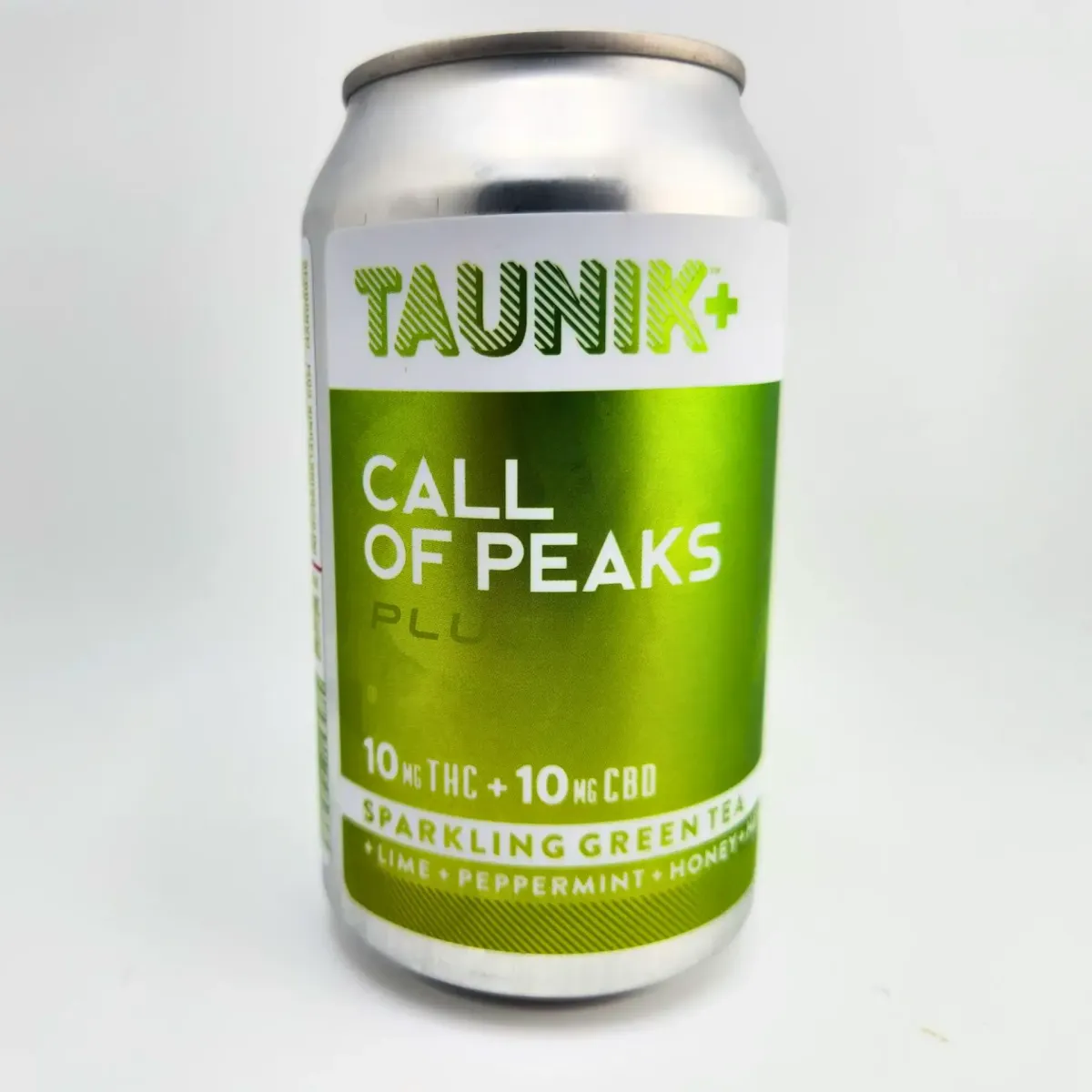 Taunik+ Call of Peaks cannabis beverage, sparkling green tea infused with 10mg THC and 10mg CBD, lime peppermint honey flavor, packaged in silver and green can.
