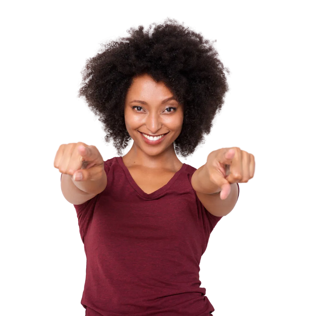 Confident Black woman pointing forward and smiling — symbolizing empowerment, bold action, and personal transformation through BOLD Academy’s coaching for Black women.
