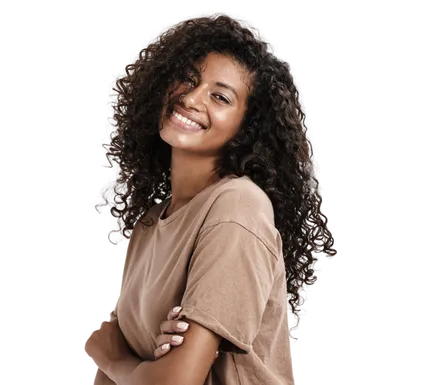 Confident Black woman smiling — embodying the empowered, bold mindset cultivated inside BOLD Academy by Dr. Natasha Booker.