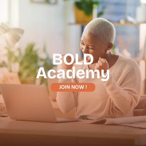 Black woman celebrating while working on her laptop — BOLD Academy by Dr. Natasha Booker helps ambitious women go from stuck to thriving.