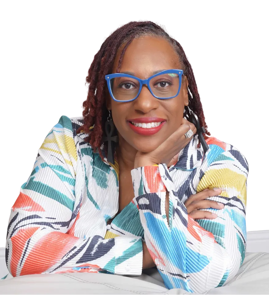 Picture of Dr. Natasha Booker, life coach for Black women, smiling confidently in professional portrait