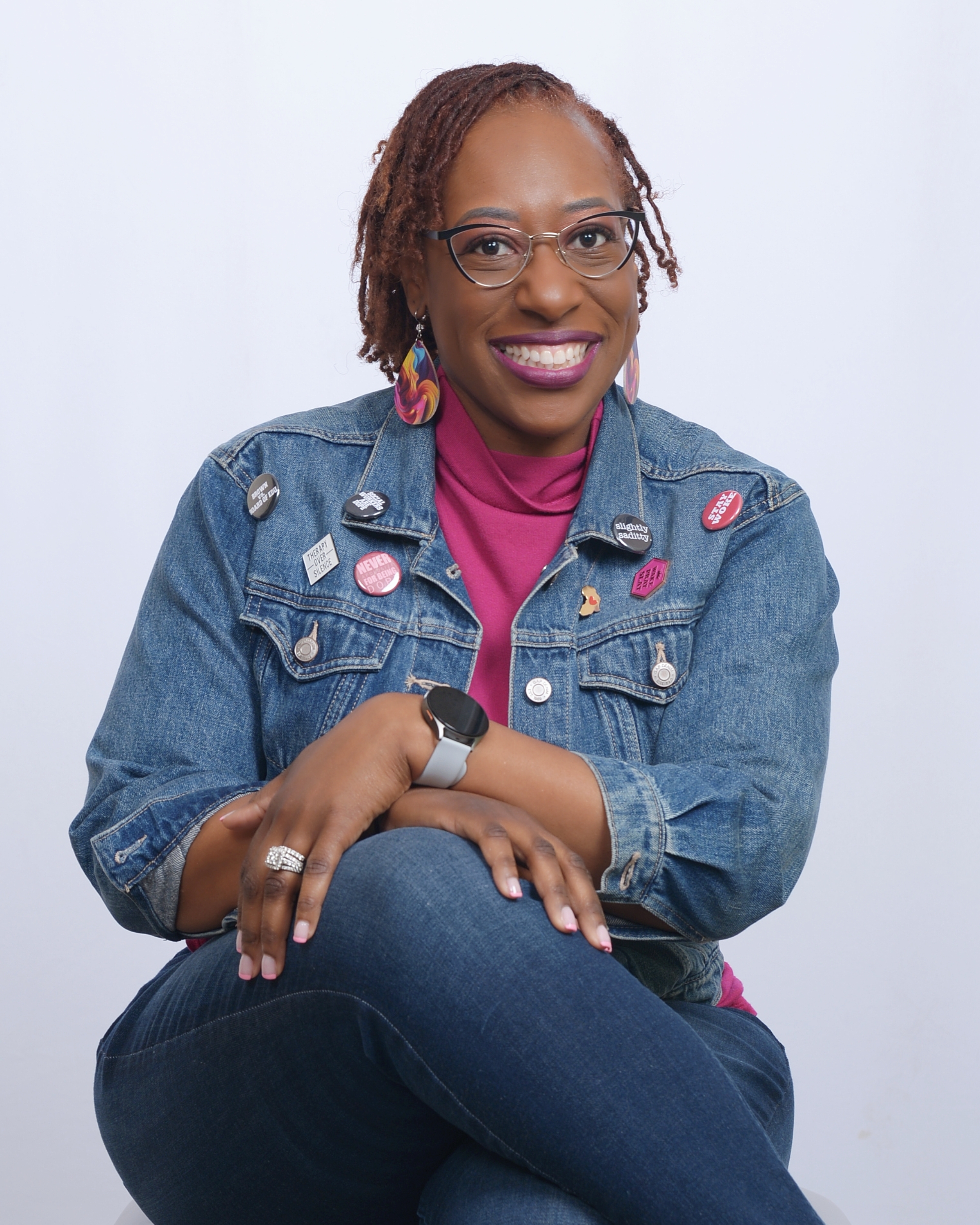Dr. Natasha Booker, coach for Black women, smiling confidently in professional portrait